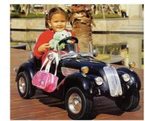 yapboz Kız klasik bir oyuncak araba